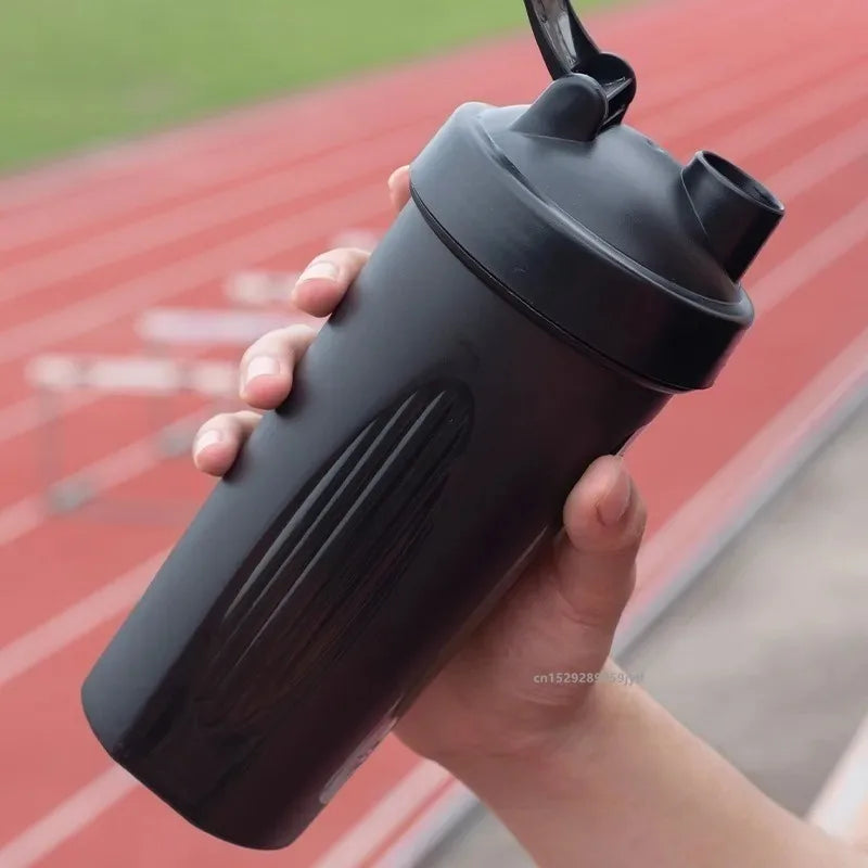 Sports Shaker Protein Bottle with steel Ball Powder Shake Cup Water Bottle Plastic Mixing Cup Body Building Exercise Bottle Image principale du produit